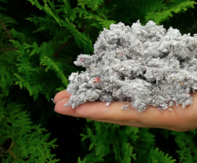 Shredded newspapers as a material to create acoustic insulation panels