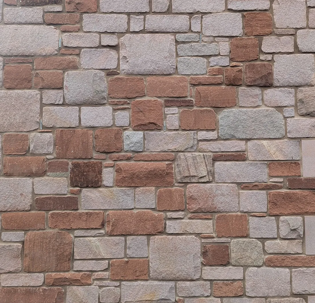 Close-up of Red and Pink Mix Walling by Hutton Stone