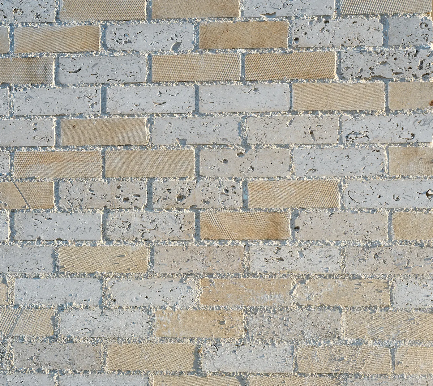 Close-up of natural stone brick facade used in the Stone Demonstrator project