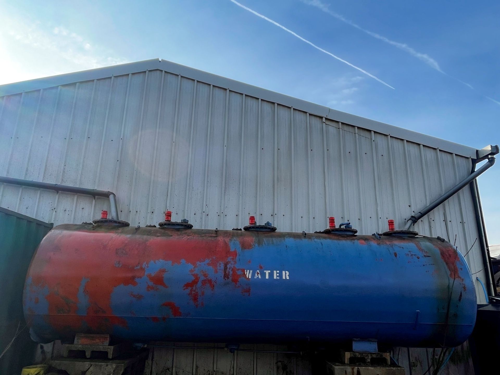 Rainwater storage tank at H.G. Matthews' Brickworks, Bellingdon, used to store harvested water for reuse in production