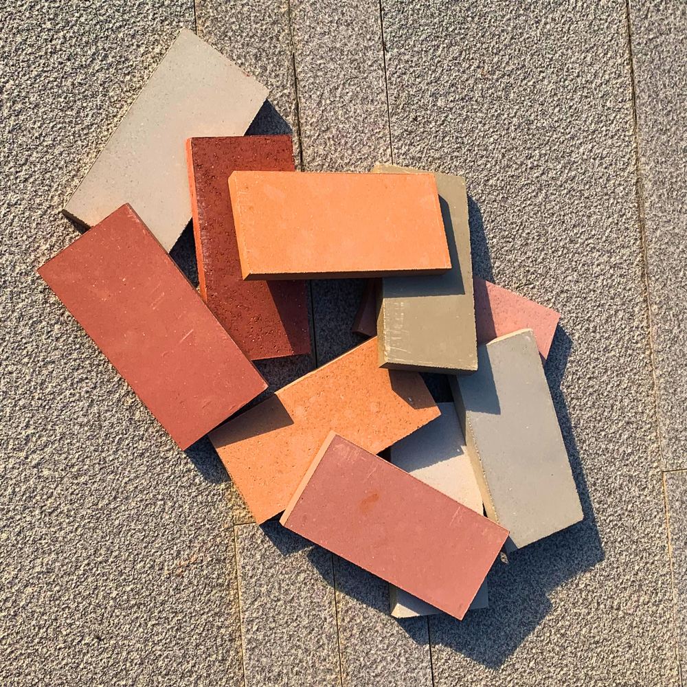 e4E brick slips in a range of colours on a stone surface