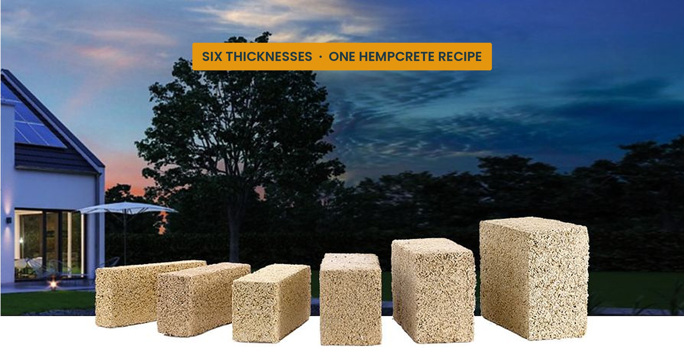 Six hempcrete blocks from The Hemp Block Company, HB80 to HB400, in front of a contemporary home at dusk